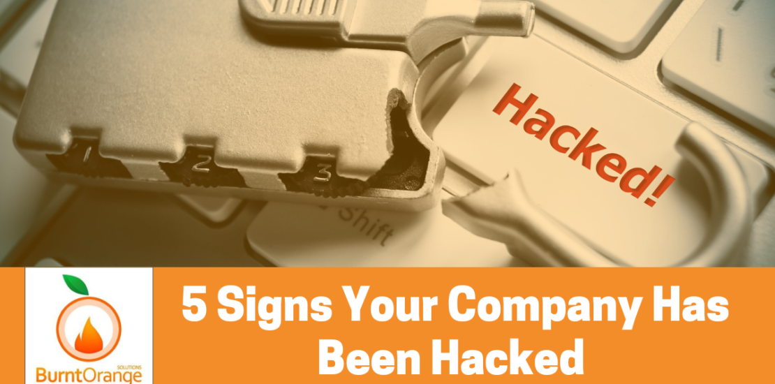 5 signs your company has been hacked, with picture of a keyboard and the word hacked on the enter key